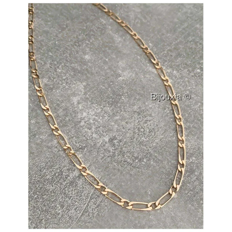 Chaîne en plaqué or figaro maille 1 2 largeur 5mm et longueur 50cm Chaîne en plaqué or figaro maille 1 2 largeur 5mm et longueur 50cm
