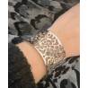 Bracelet jonc manchette ouvert motifs ajourés en acier inoxydable argenté