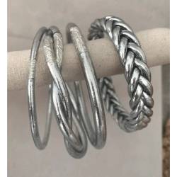 Bracelet véritable jonc bouddhiste modèle twist torsadé couleur argentée
