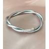 Bracelet véritable jonc bouddhiste modèle twist torsadé couleur argentée