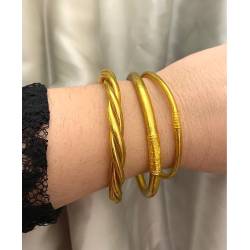 Bracelet véritable jonc bouddhiste twist torsadé couleur or dorée