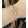 Bracelet jonc ouvert nœud en plaqué or 18 carats 750/000