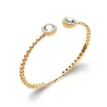 Bracelet Jonc Solitaire Pierre Bleu Aigue Marine Plaqué or 18 Carats 750/1000